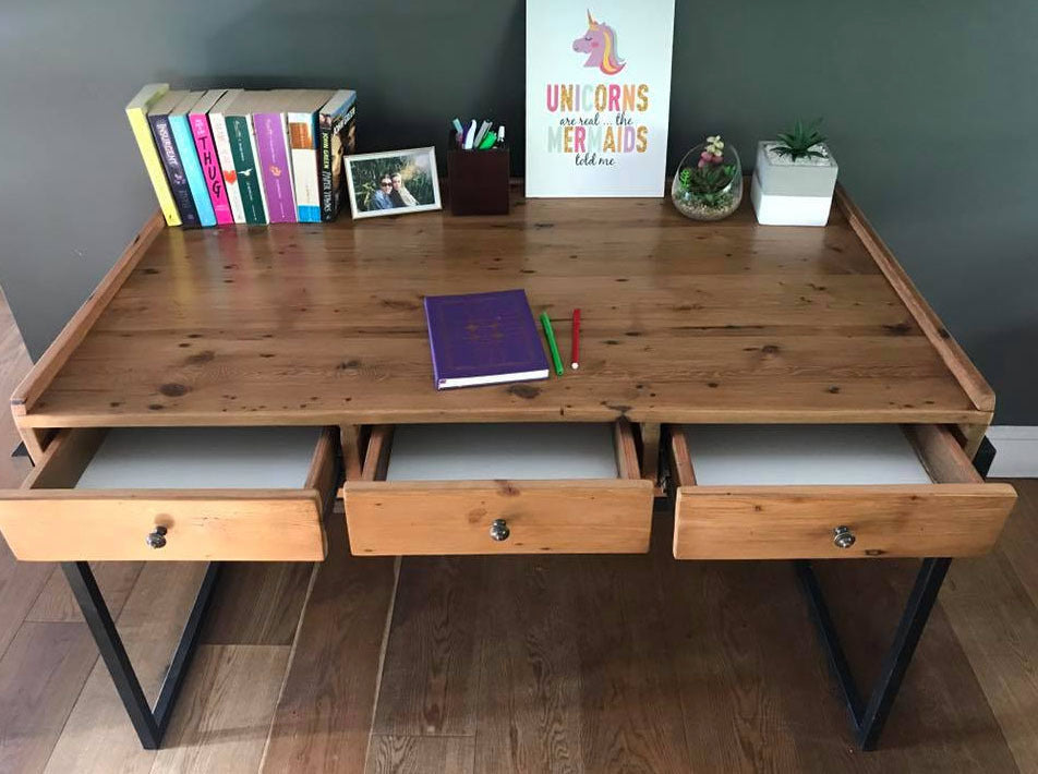 Custom made wooden desk with storage drawers. 