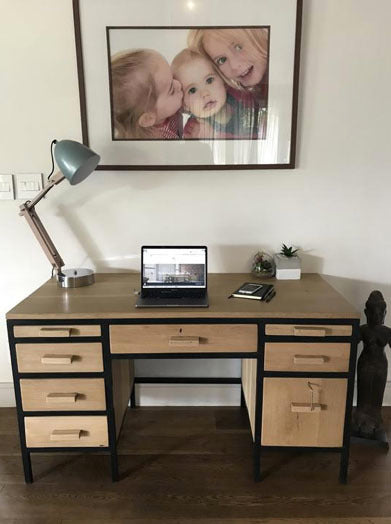 Custom crafted wooden study desk with centre and side storage draws. 