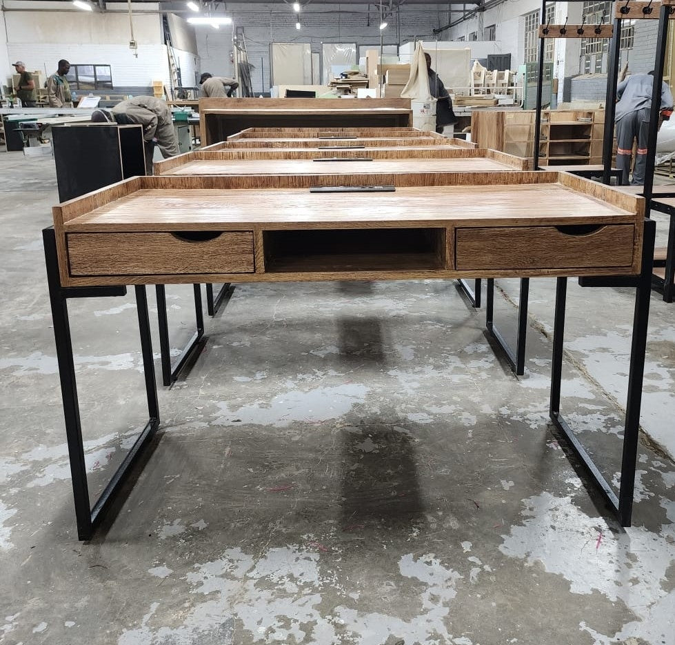 Custom made study desk with black metal legs, side draws and centre storage space.