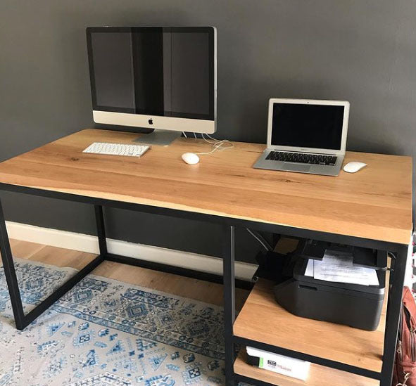 Custom made wooden study desk with side storage shelves and black metal legs.