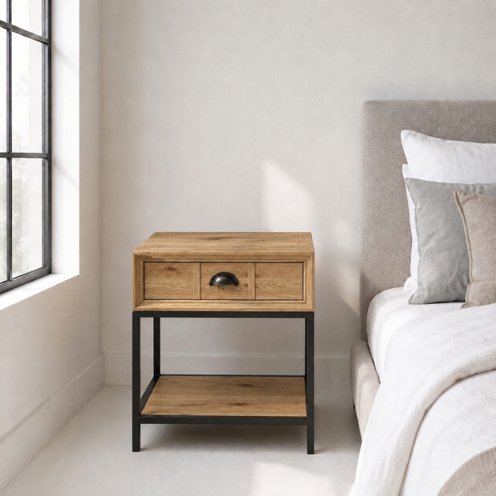The Latika Nightstand is made from reclaimed Oak with powder-coated metal legs. A compact bedside piece with genuine urban character.