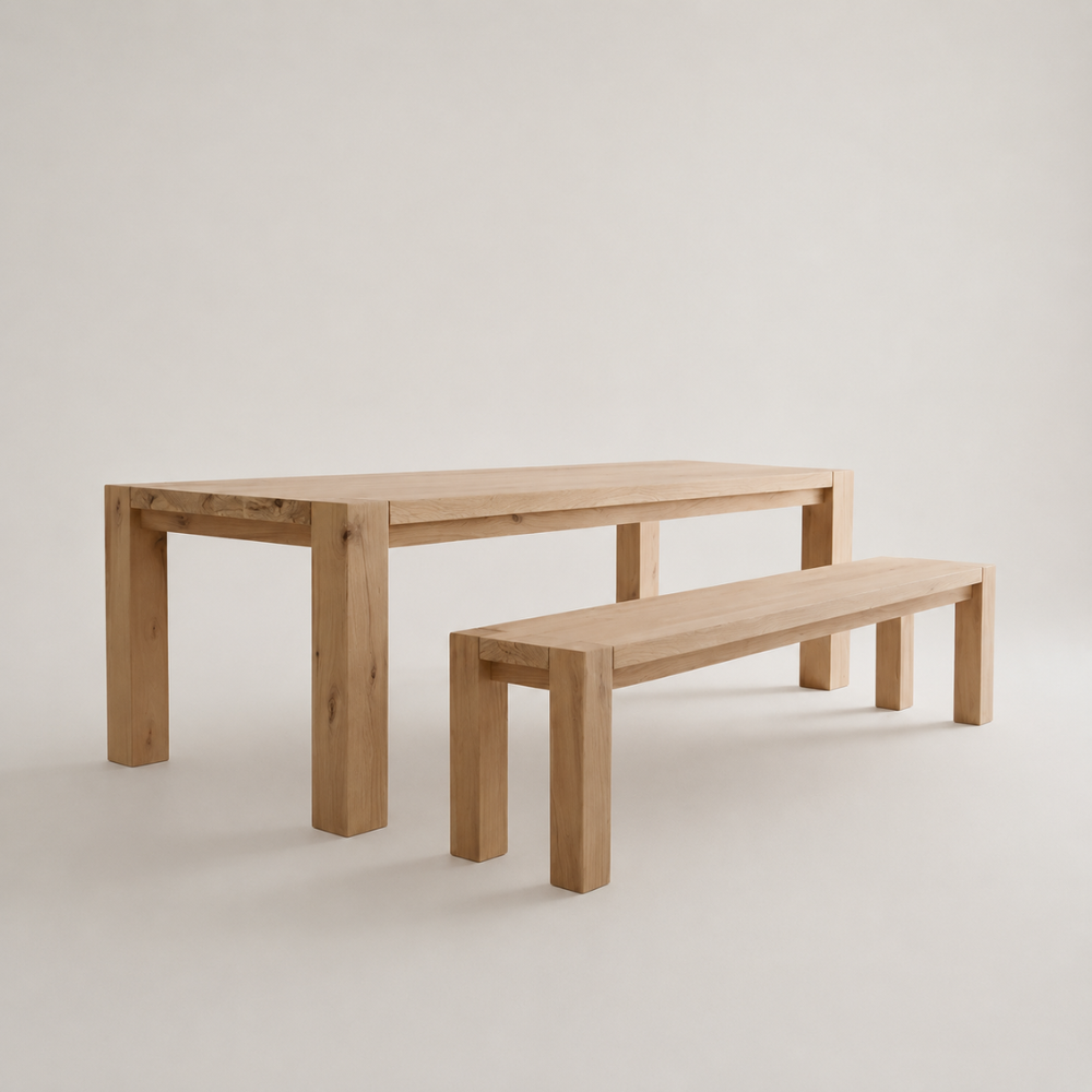 The Masai Oak Bench is handcrafted from solid oak with architectural cant-style legs. Pairs with the Masai Table or stands alone. Made to order in SA.