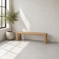 The Masai Oak Bench is handcrafted from solid oak with architectural cant-style legs. Pairs with the Masai Table or stands alone. Made to order in SA.
