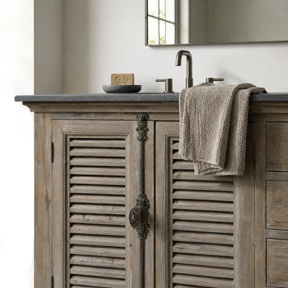 The Nibela Vanity Unit is a handcrafted reclaimed timber bathroom piece with double shutter doors and interior drawers. Stone tops quoted separately.