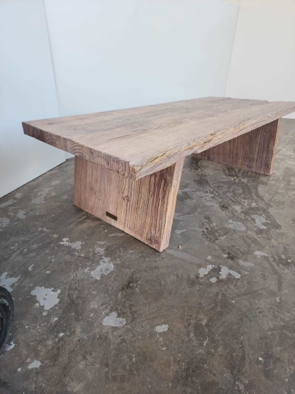 Custom made oak dining room table with square leg design.
