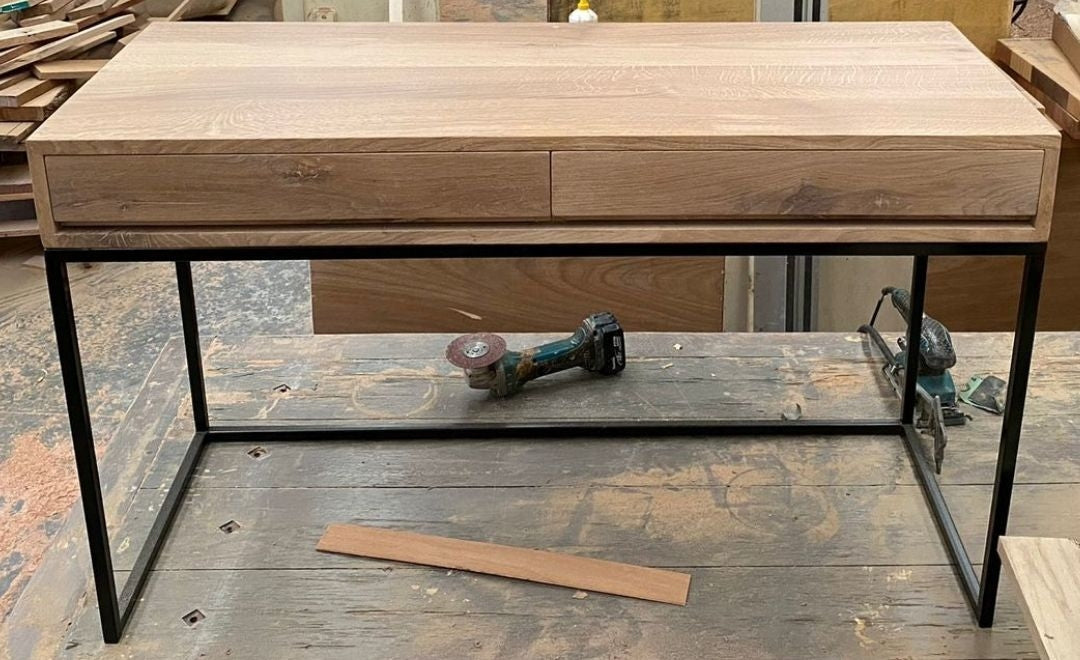 Custom made oak desk with black metal legs and dual draw space.