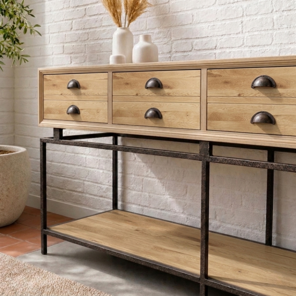The Oakdale Console is built from reclaimed Oak with four deep drawers and an urban, characterful finish. A strong storage piece for any room.