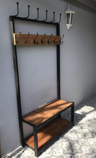 Custom made oregon coat stand with black metal frame and legs.