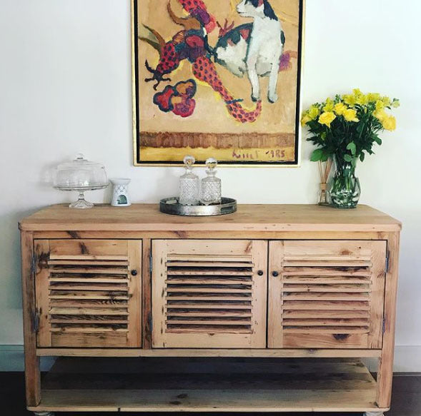 Custom made oregon cabinet with slatted doors.