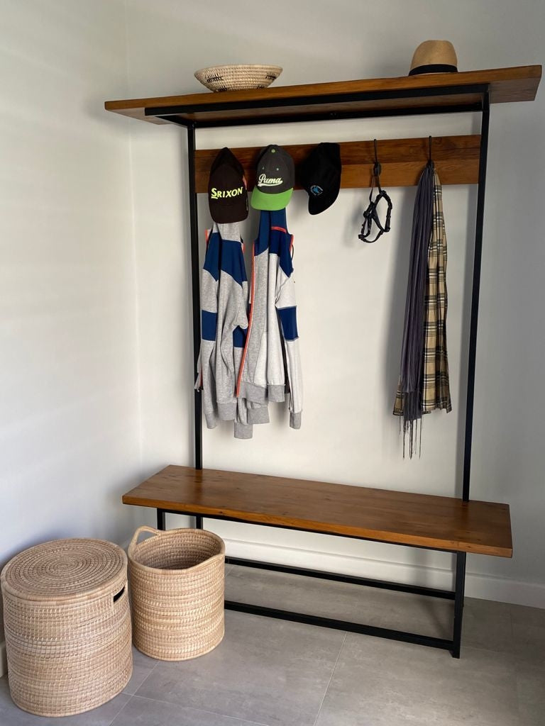 Custom made oregon coat stand with black metal frame and legs.