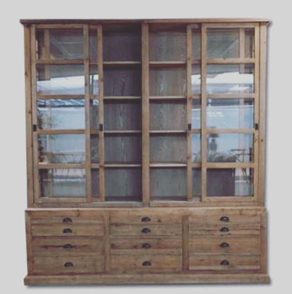 Large Custom Made Wooden Cabinet with sliding wooden doors and multi-draw compartment space.
