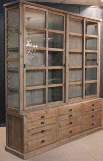 Large Custom Made Wooden Cabinet with sliding wooden doors and multi-draw compartment space.