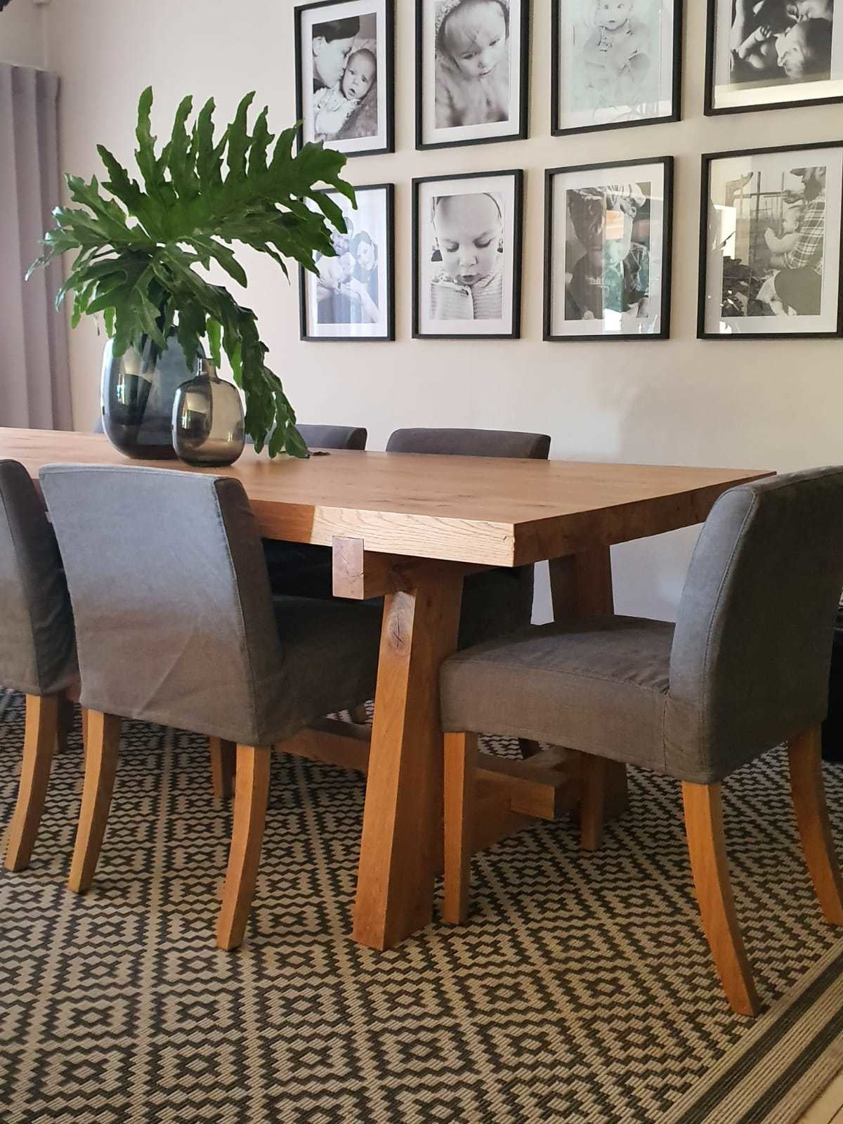 Large custom made wooden dining room table with A legs.