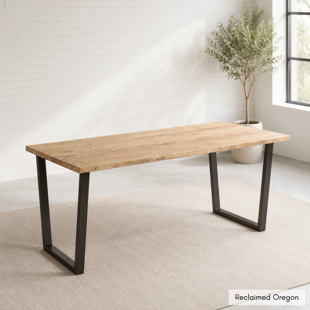 The Waterloo is a solid timber top on angled powder-coated steel legs — works as a dining table, desk, or workstation. Custom made to order in SA.