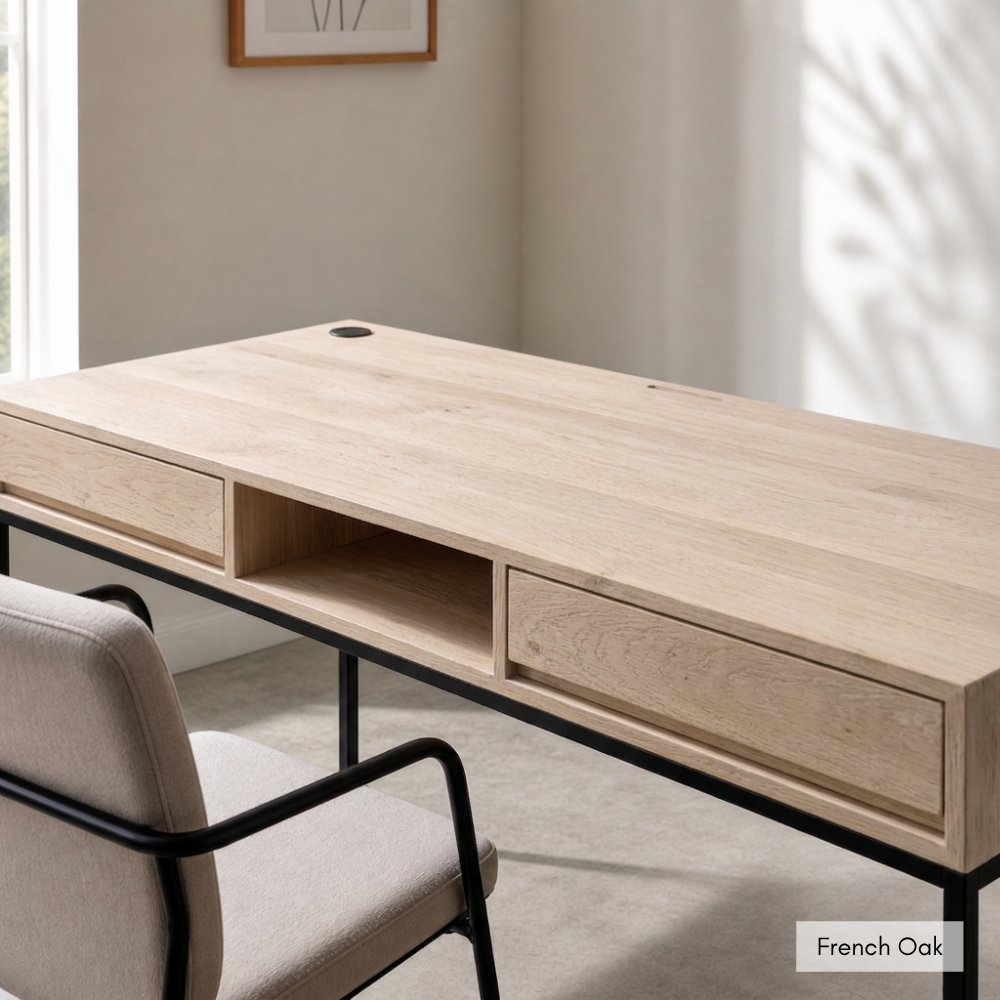 The Tiro Study Desk is custom made from Grade A Solid Oak with a central pigeon hole, two drawers, and concealed cable management. Made to order in SA.