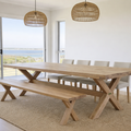 Handcrafted in South Africa from solid timber, the Sabi Cross Leg Dining Table features a bold thick top and matching cross-leg base. Made to order.