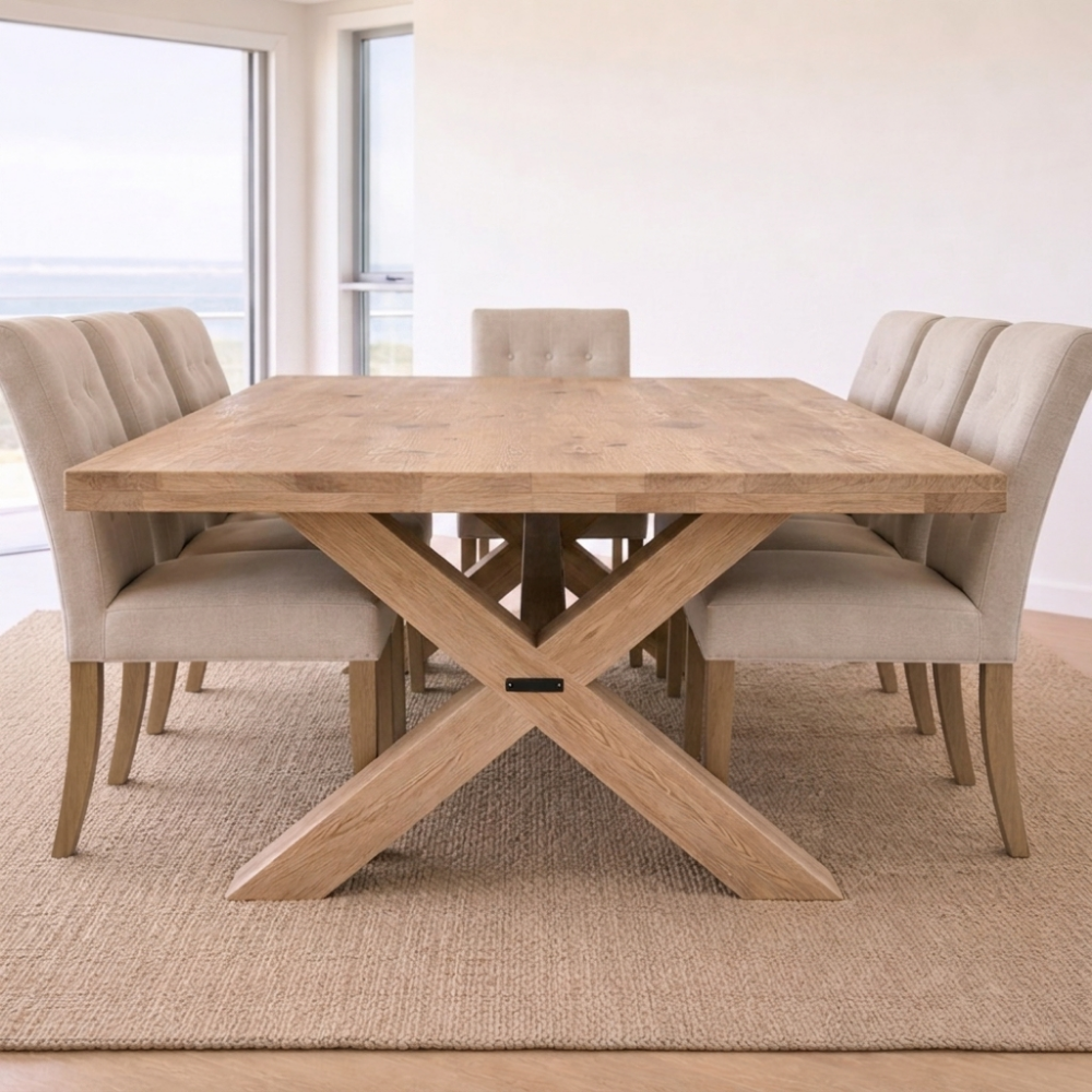 Handcrafted in South Africa from solid timber, the Sabi Cross Leg Dining Table features a bold thick top and matching cross-leg base. Made to order.