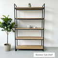 The Zuri One Modular Shelf combines a slim black tubular steel frame with solid timber shelves. Modular and fully customisable. Delivered assembled.