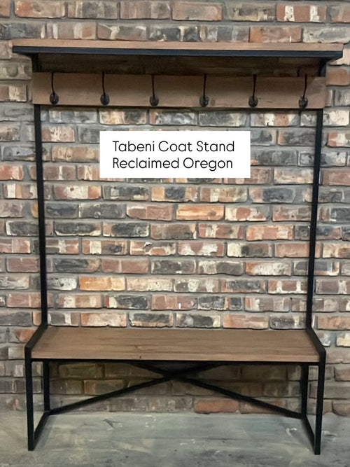 Tabeni coat stand with wooden bench against a brick wall