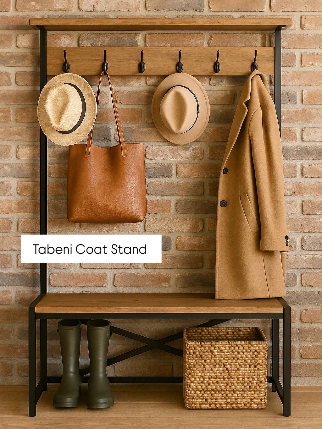Tabeni coat stand with hats, coat, bag, and boots against a brick wall.