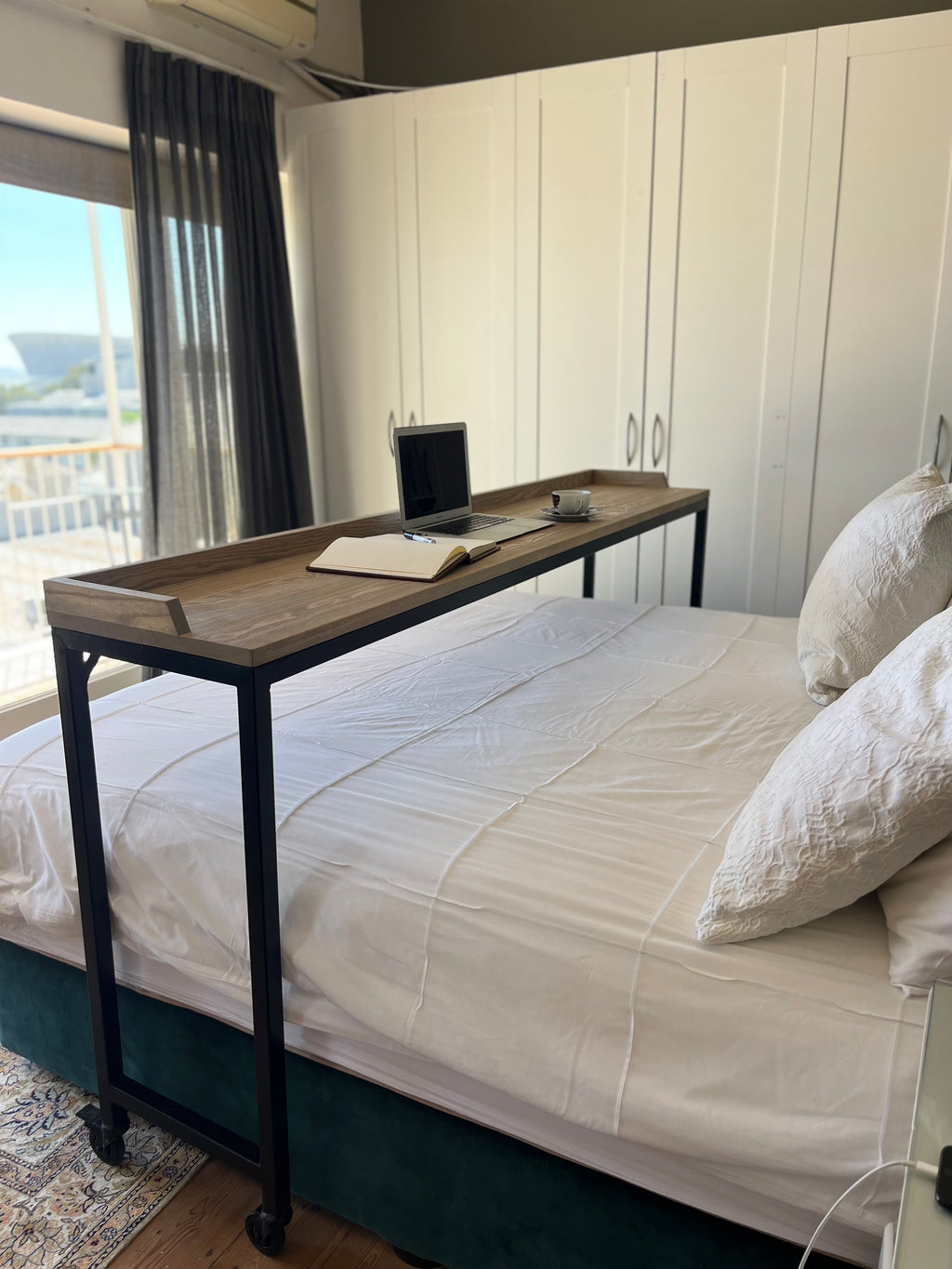 Over-bed wooden desk for work and relaxing. 