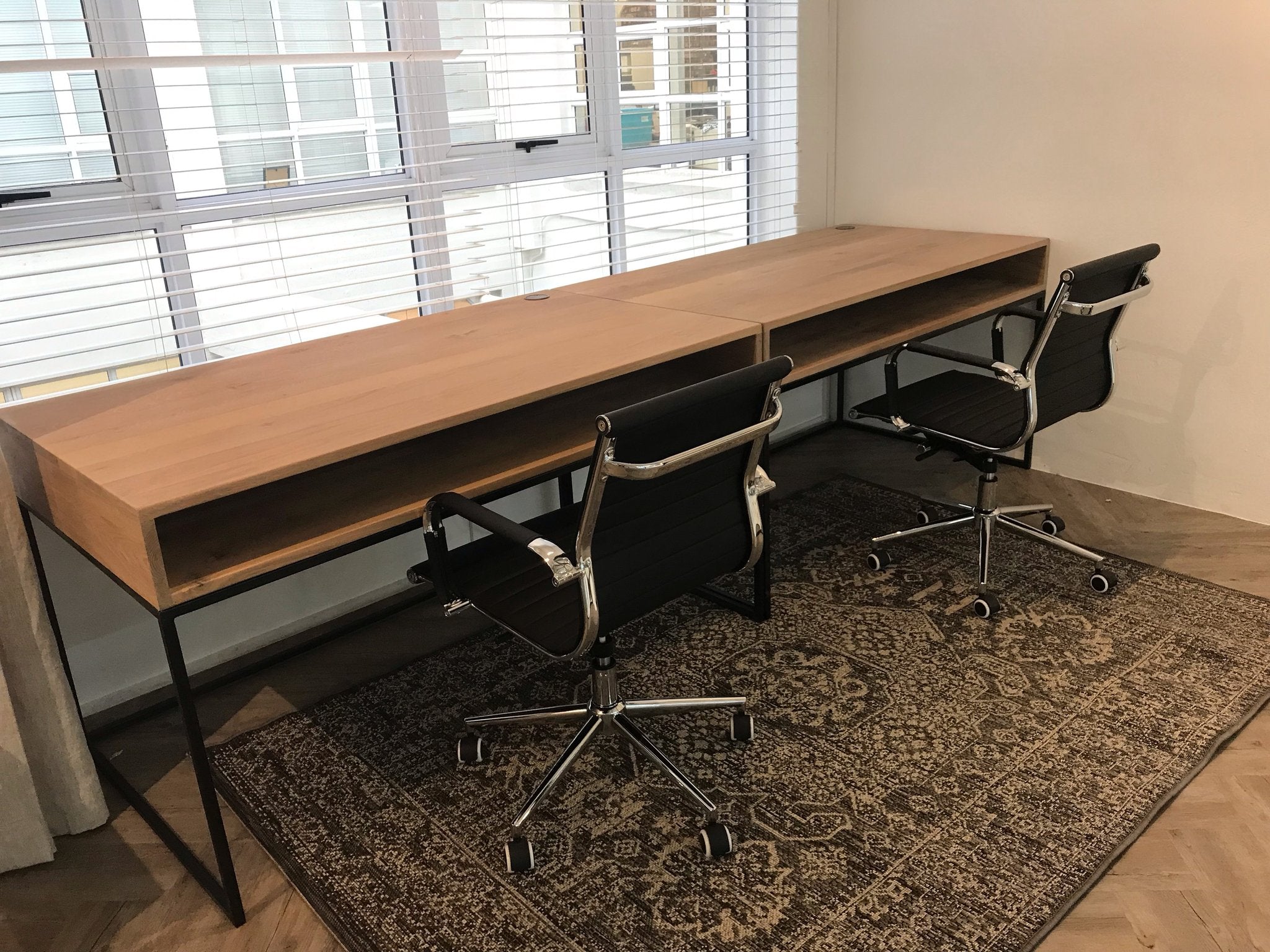 The Boa  Study Desk is custom made in solid Oak on a tubular metal frame with concealed cable panels and surface cable holes. Made to order in SA.