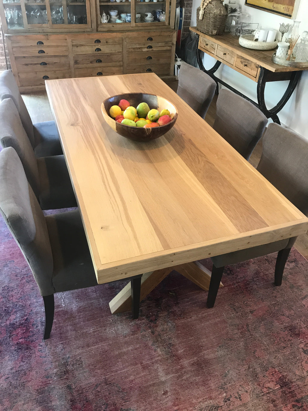 The Framed Border Cross Leg Table has a solid timber top with a framed perimeter border and a sturdy cross-leg base. Custom made to order in SA.