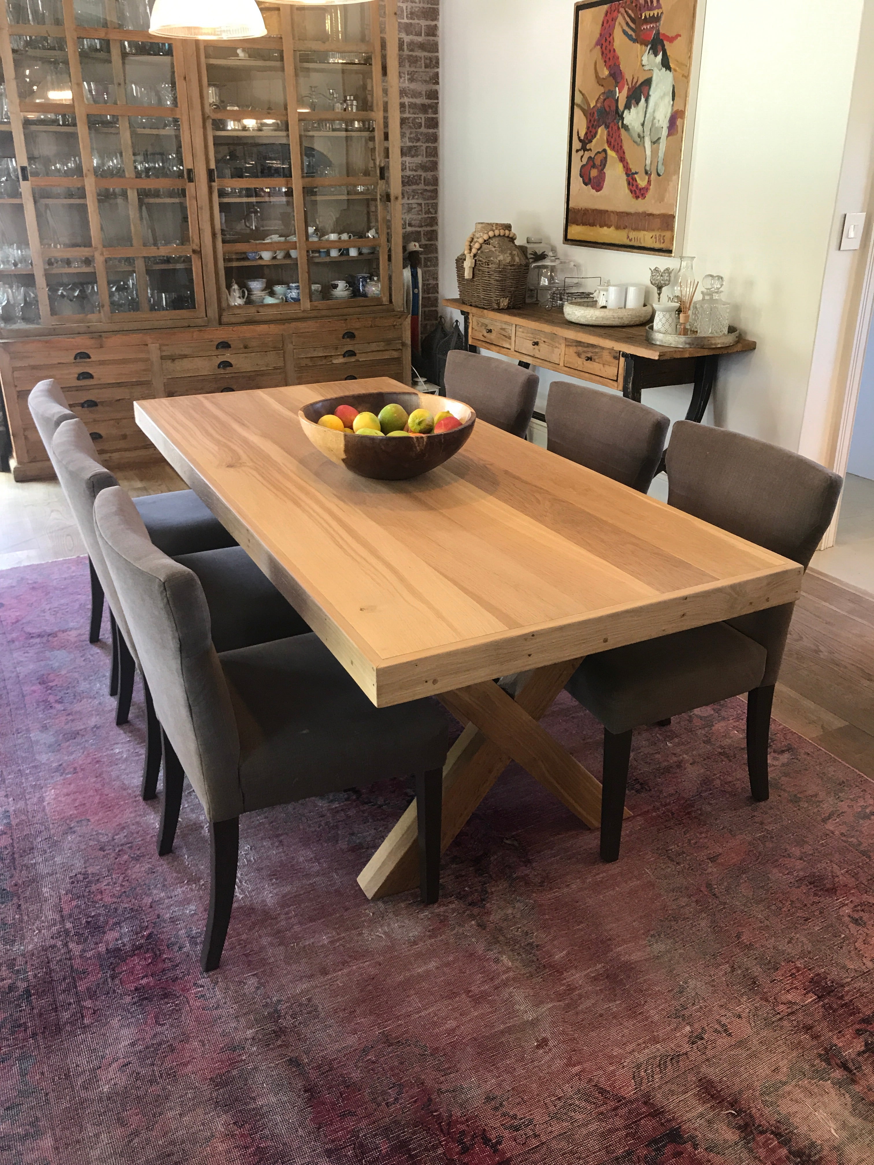 The Framed Border Cross Leg Table has a solid timber top with a framed perimeter border and a sturdy cross-leg base. Custom made to order in SA.