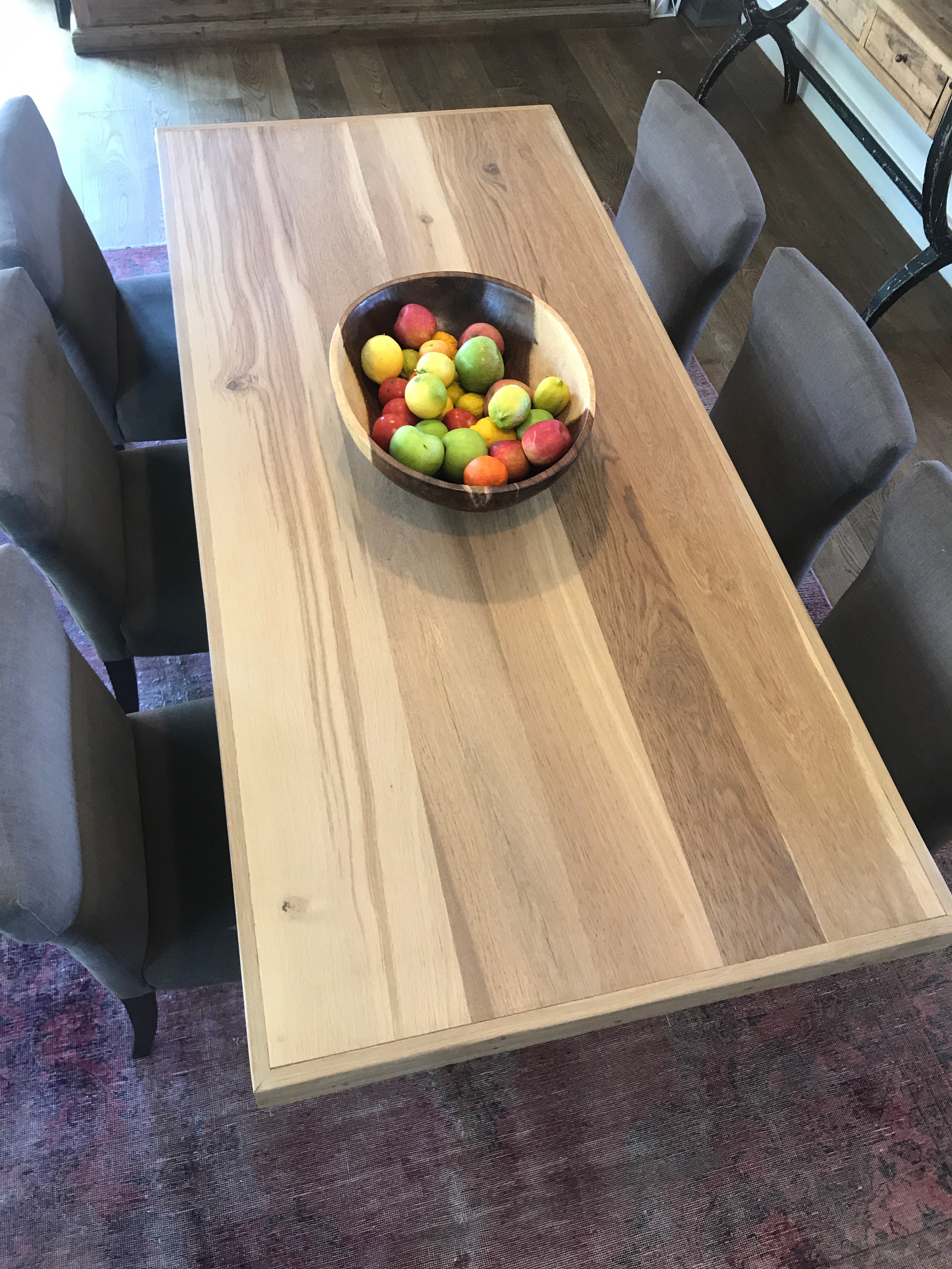 The Framed Border Cross Leg Table has a solid timber top with a framed perimeter border and a sturdy cross-leg base. Custom made to order in SA.