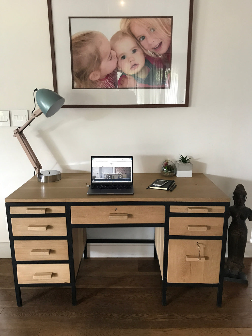 The Ruby Retro Desk is a 1970s-inspired solid timber desk with pull-out side rests, retro handles, and two lockable drawers. Custom made to order.
