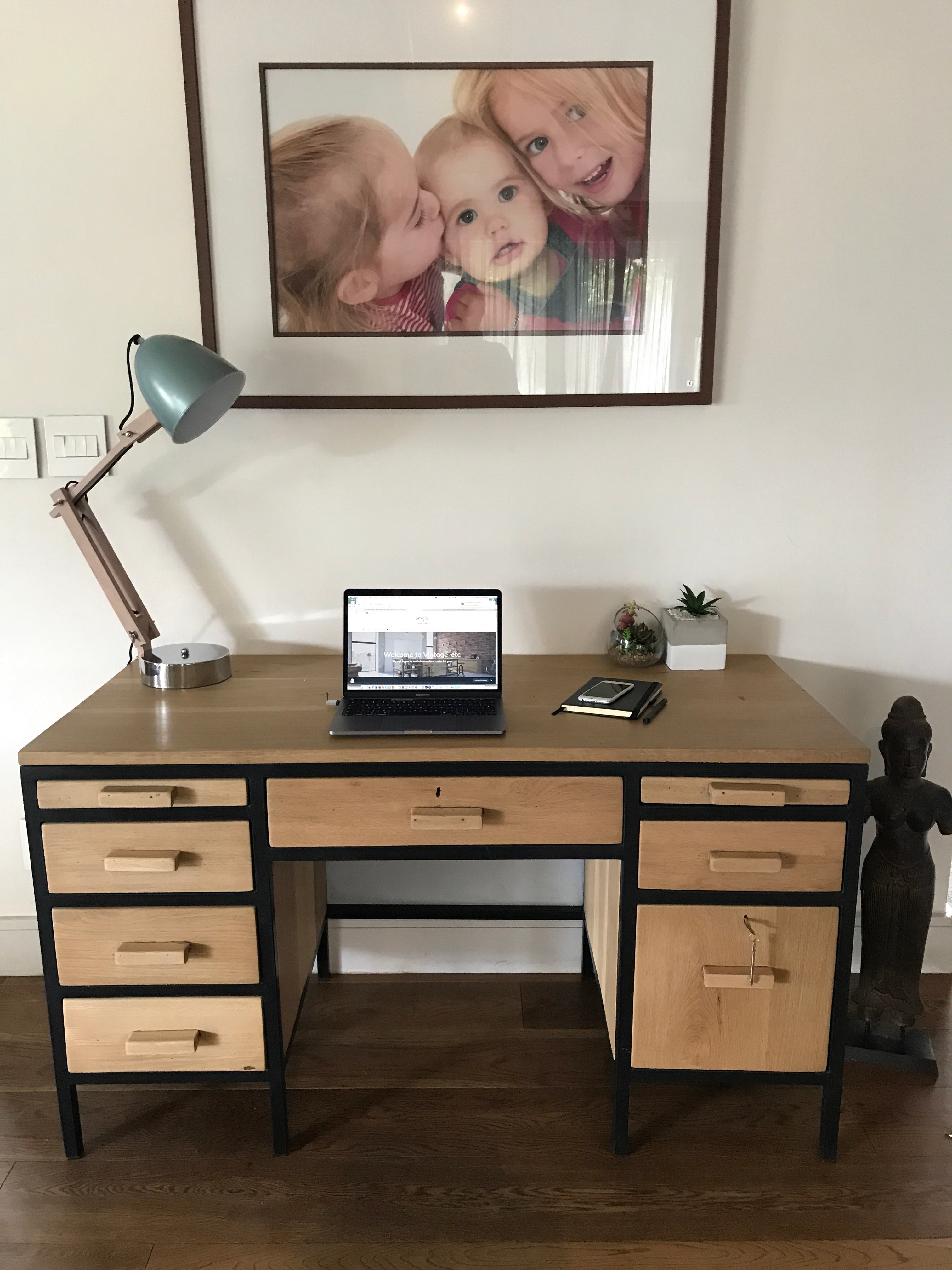 The Ruby Retro Desk is a 1970s-inspired solid timber desk with pull-out side rests, retro handles, and two lockable drawers. Custom made to order.