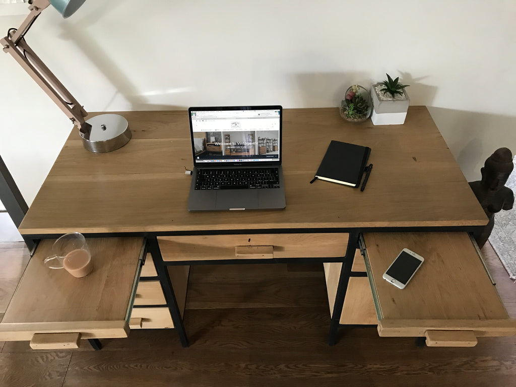 The Ruby Retro Desk is a 1970s-inspired solid timber desk with pull-out side rests, retro handles, and two lockable drawers. Custom made to order.