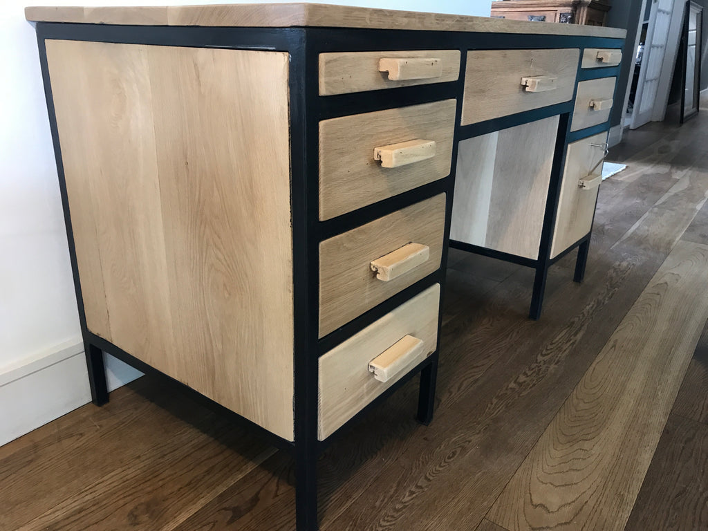 The Ruby Retro Desk is a 1970s-inspired solid timber desk with pull-out side rests, retro handles, and two lockable drawers. Custom made to order.