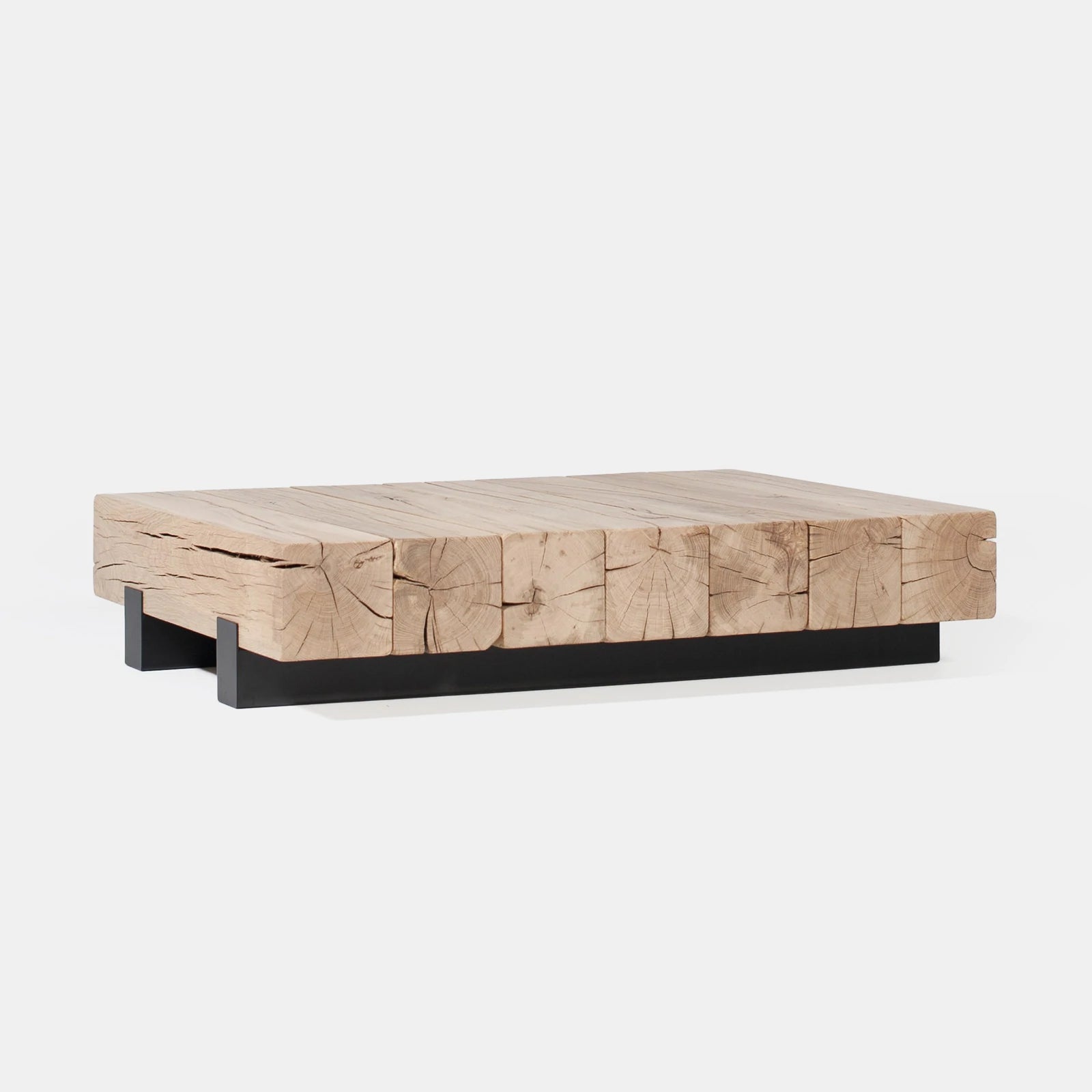 The Umthi Block Coffee Table is made from laminated Oak cants with natural irregularities and a food-safe bleached sealant finish. Custom made to order.