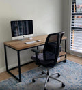 The Vuyani Desk is a popular timber and tubular metal desk with integrated shelving on the left or right. Fully assembled. Custom made to order in SA.