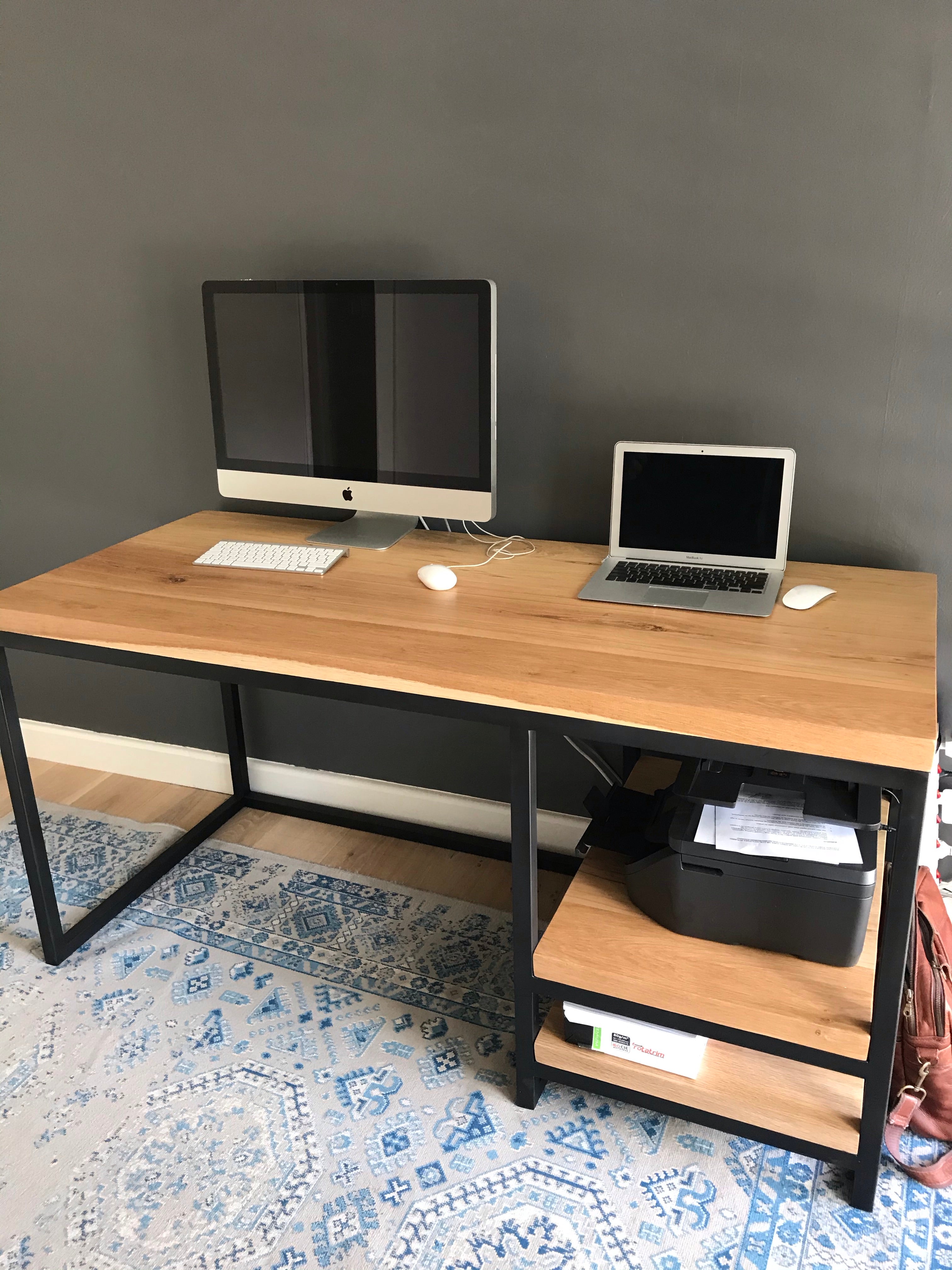 The Vuyani Desk is a popular timber and tubular metal desk with integrated shelving on the left or right. Fully assembled. Custom made to order in SA.