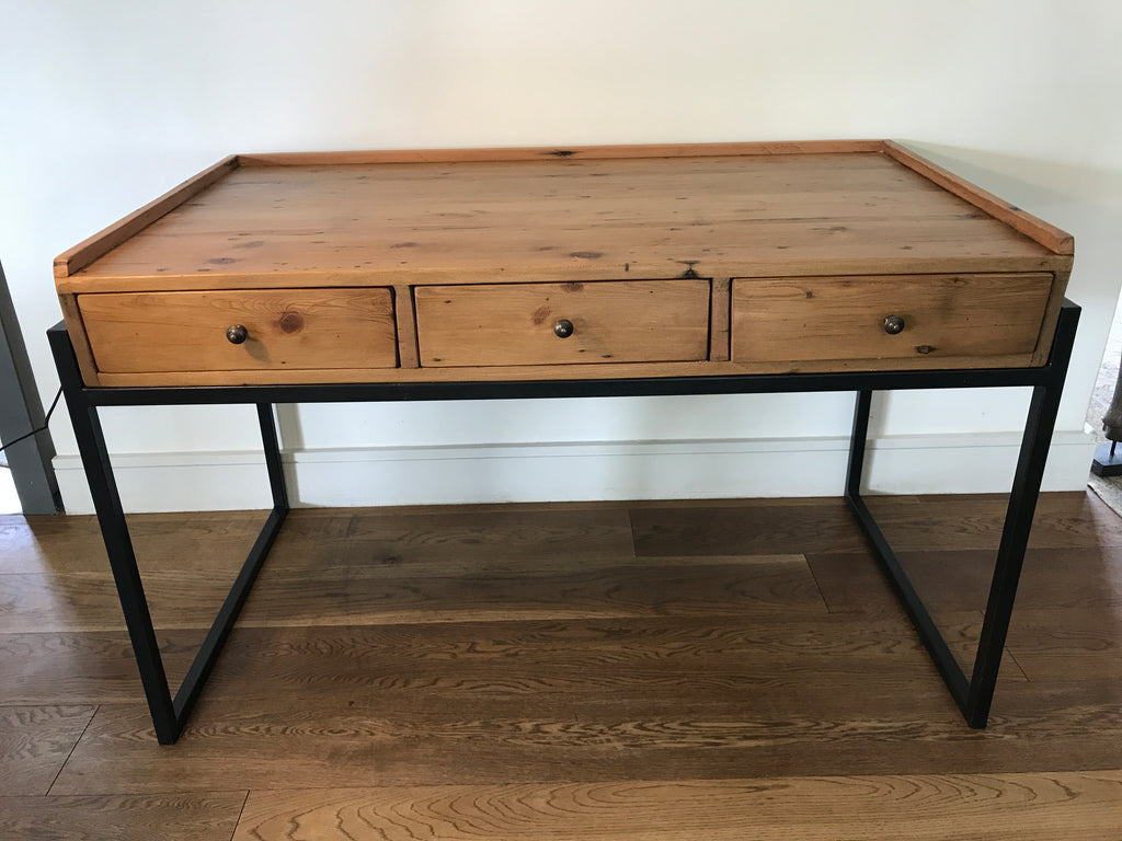 Custom made rustic pine desk with metal legs and three wooden draws.